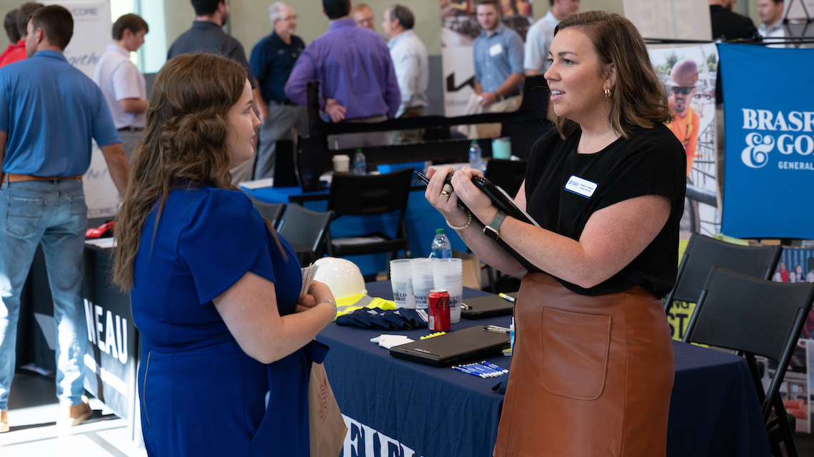 Students and employers at career fair